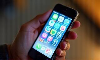 Smartphone displaying social media content